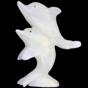 Afghan Jade hand-carved leaping Dolphin pair 76*35*105mm 252g in sunlight - Rocks and Things Store