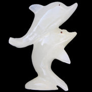 Afghan Jade hand-carved leaping Dolphin pair 76*35*105mm 252g in sunlight - Rocks and Things Store