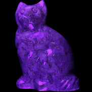 Fossil stone hand-carved Cat 81*45*115mm 534g in UV light - Rocks and Things Store