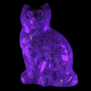 Fossil stone hand-carved Cat 81*45*115mm 534g in UV light - Rocks and Things Store