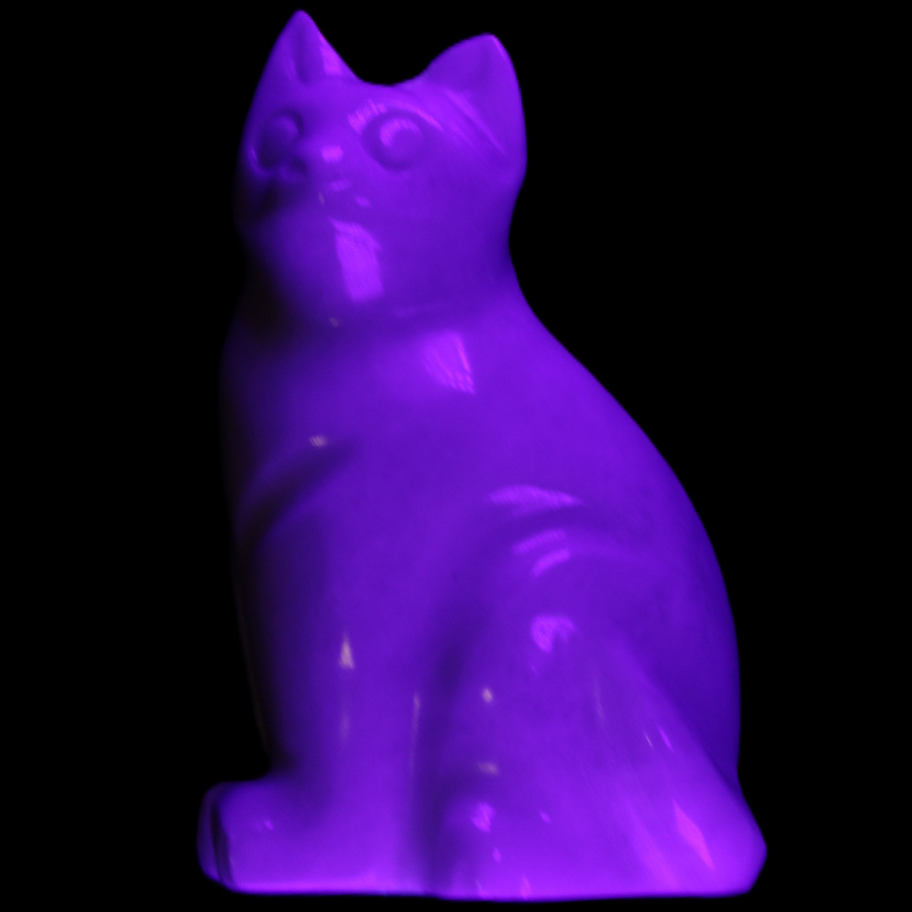 White Jade hand-carved Cat 69*46*111mm 466g in UV light - Rocks and Things Store