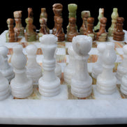 Afghan Jade Onyx hand-carved Chess Set in case in sunlight - Rocks and Things Store