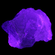 Clear Fluorite cubic cluster 82*58*60mm 404g in UV light - Rocks and Things Store