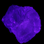 Clear Fluorite cubic cluster 82*58*60mm 404g in UV light - Rocks and Things Store