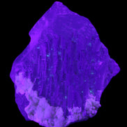 Clear with Violet tinged Fluorite cubic cluster 75*72*55mm 386g in UV light - Rocks and Things Store