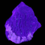 Clear with Violet tinged Fluorite cubic cluster 75*72*55mm 386g in UV light - Rocks and Things Store