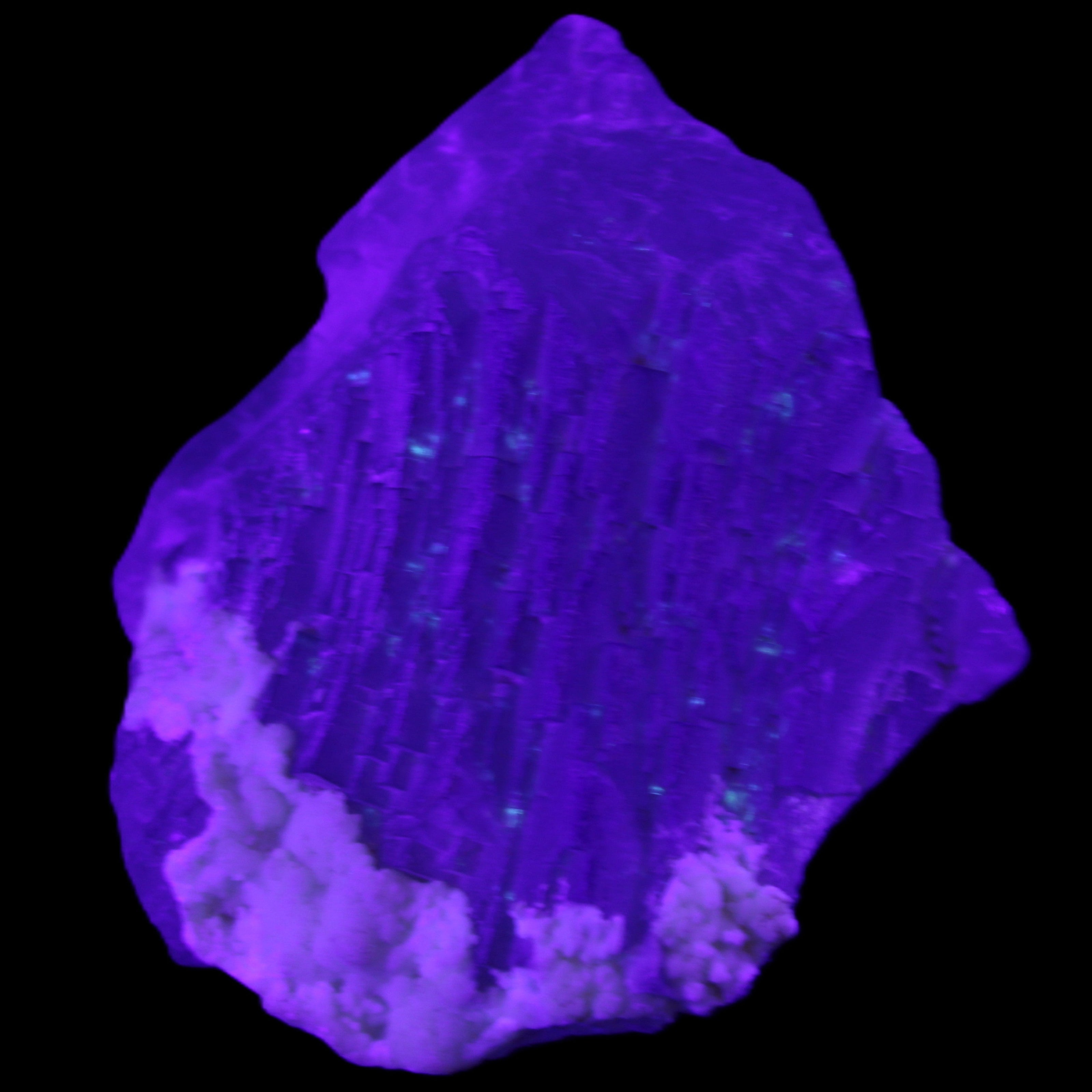 Clear with Violet tinged Fluorite cubic cluster 75*72*55mm 386g in UV light - Rocks and Things Store