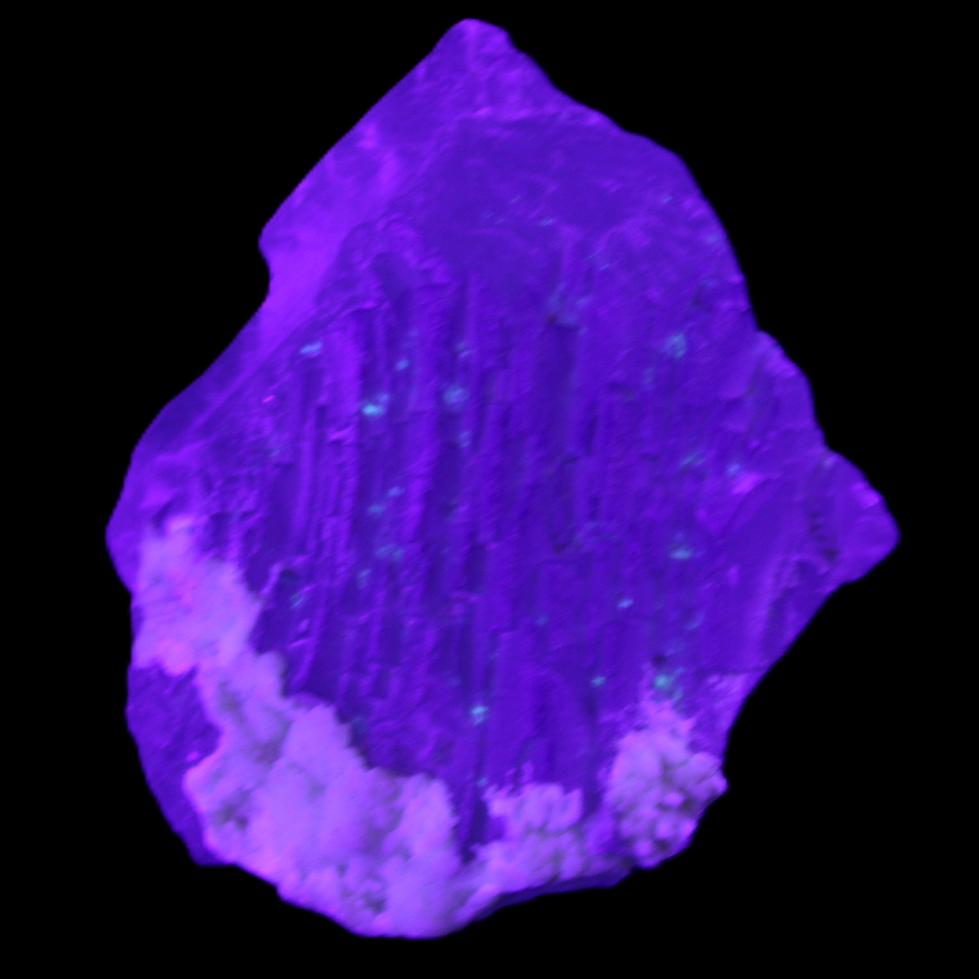 Clear with Violet tinged Fluorite cubic cluster 75*72*55mm 386g in UV light - Rocks and Things Store