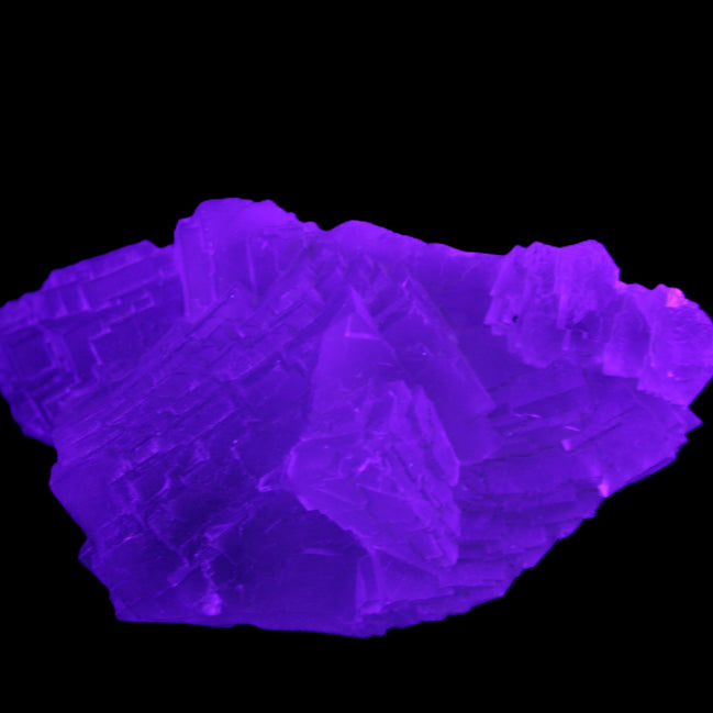 Clear Fluorite cluster 111*51*50mm 306g in UV light - Rocks and Things Store