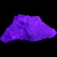 Clear Fluorite cluster 111*51*50mm 306g in UV light - Rocks and Things Store