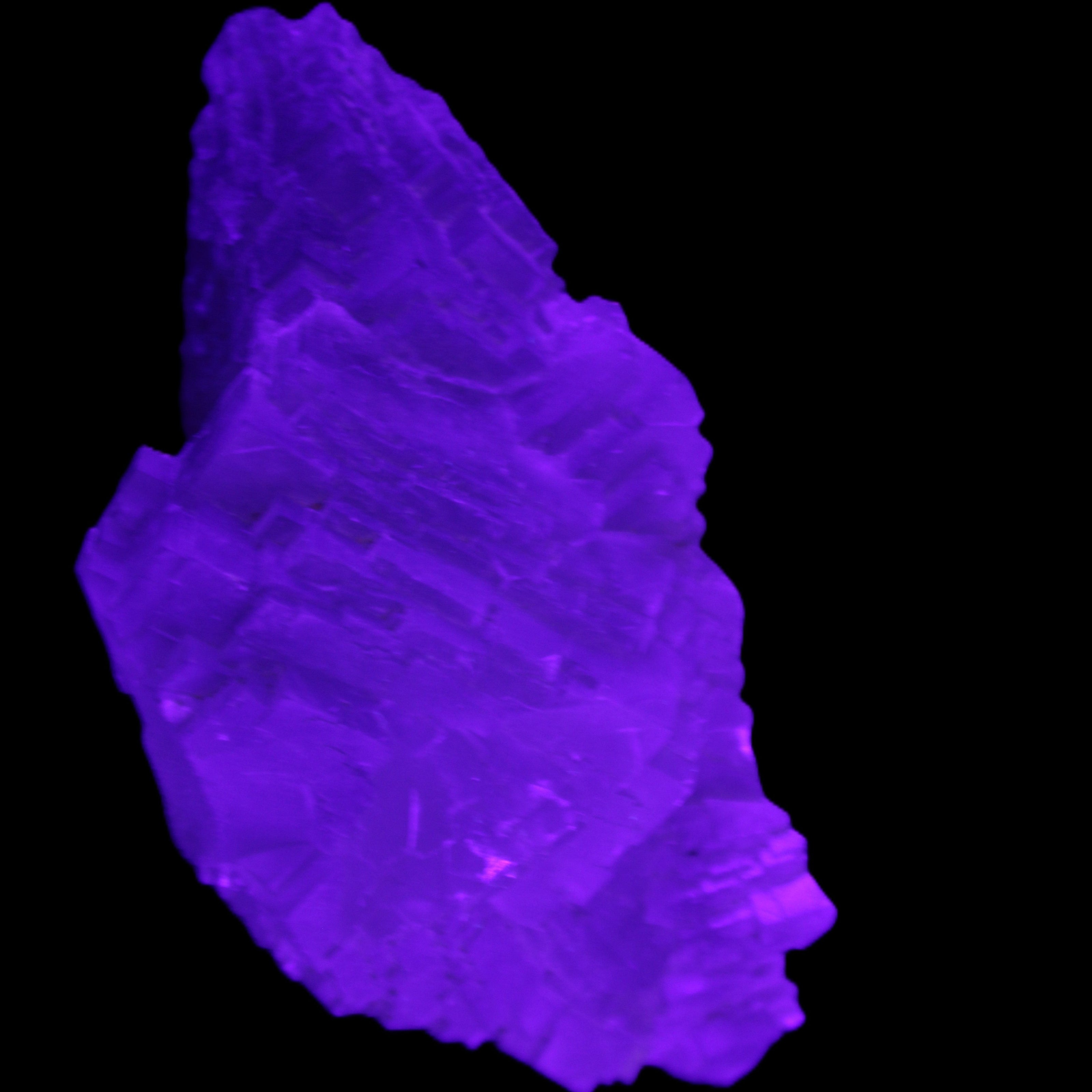 Clear Fluorite cluster 111*51*50mm 306g in UV light - Rocks and Things Store