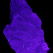 Clear Fluorite cluster 111*51*50mm 306g in UV light - Rocks and Things Store