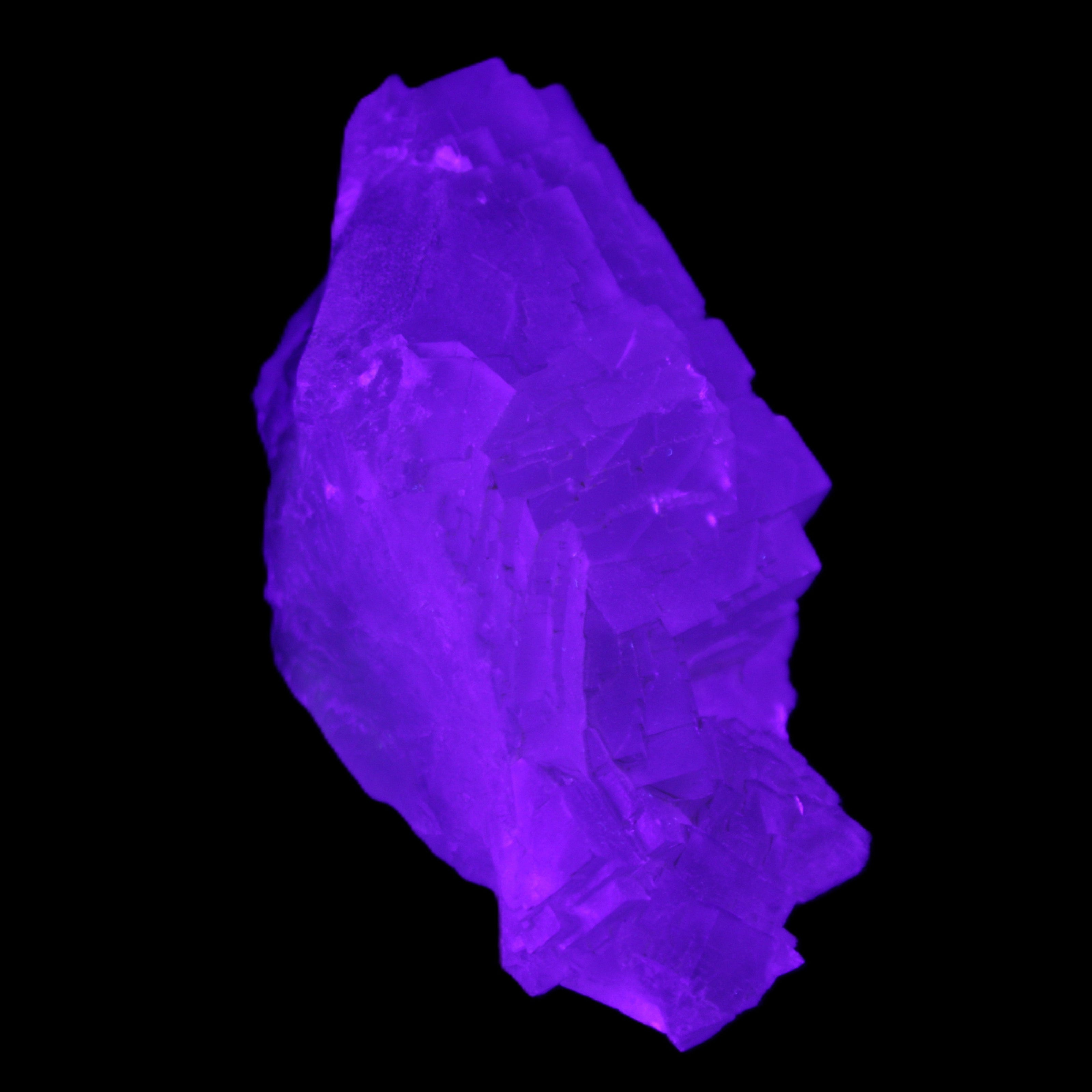 Clear Fluorite cluster 111*51*50mm 306g in UV light - Rocks and Things Store