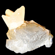 Clear Yellow Fluorite with 45mm dog-tooth Calcite 98*76*55mm 286g in sunlight - Rocks and Things Store