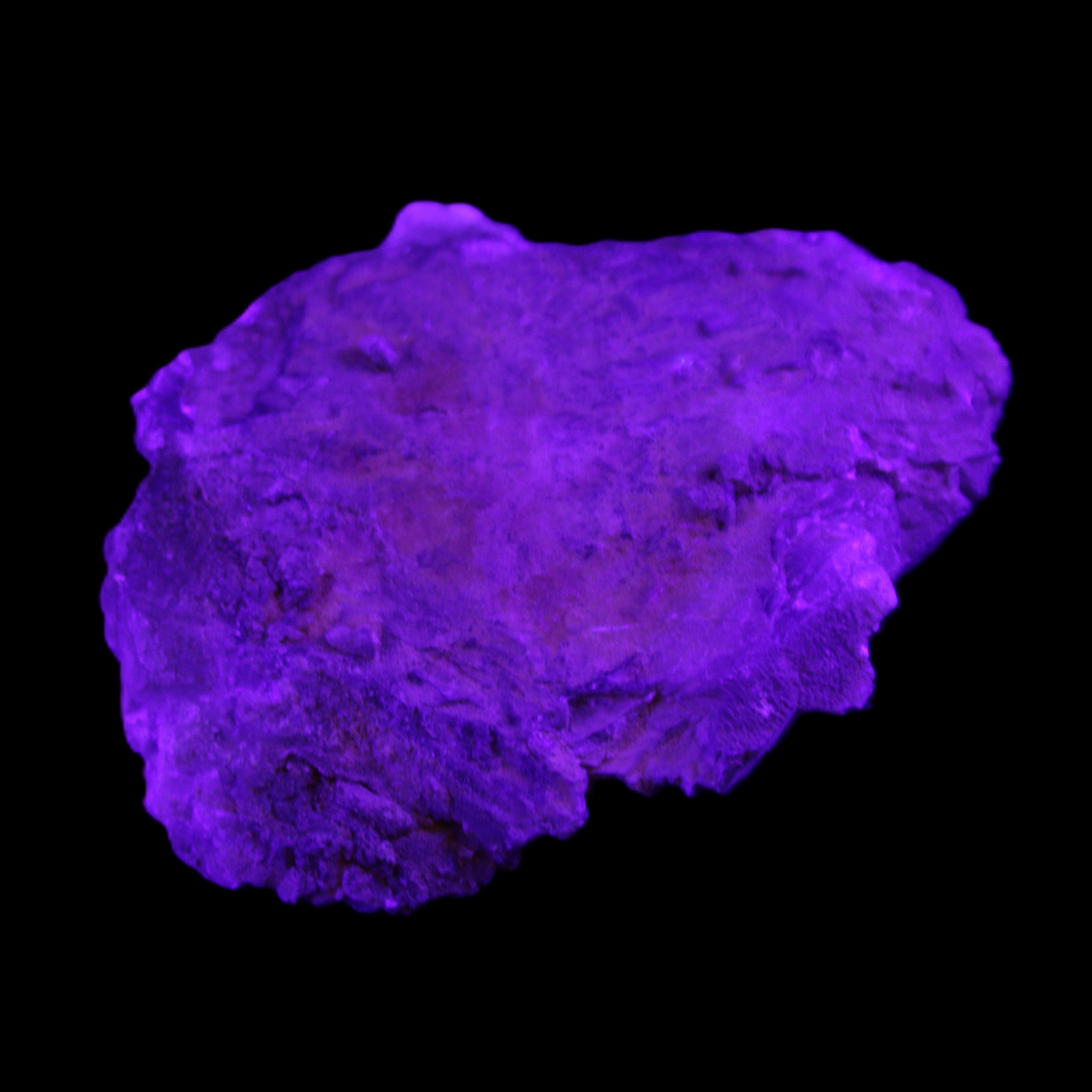 Clear Fluorite stepped cluster 87*80*28mm 238g in UV light - Rocks and Things Store