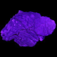 Clear Fluorite stepped cluster 87*80*28mm 238g in UV light - Rocks and Things Store