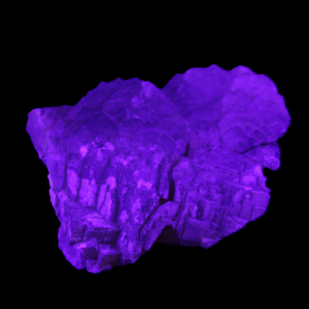 Clear Fluorite stepped cluster 87*80*28mm 238g in UV light - Rocks and Things Store