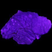 Clear Fluorite stepped cluster 87*80*28mm 238g in UV light - Rocks and Things Store