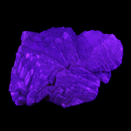 Clear Fluorite stepped cluster 87*80*28mm 238g in UV light - Rocks and Things Store