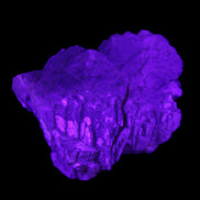 Clear Fluorite stepped cluster 87*80*28mm 238g in UV light - Rocks and Things Store