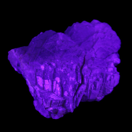Clear Fluorite stepped cluster 87*80*28mm 238g in UV light - Rocks and Things Store