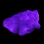 Clear Fluorite stepped cluster 87*80*28mm 238g in UV light - Rocks and Things Store