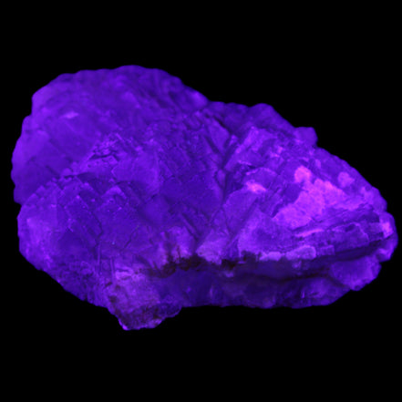 Clear Fluorite stepped cluster 87*80*28mm 238g in UV light - Rocks and Things Store
