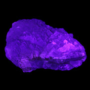 Clear Fluorite stepped cluster 87*80*28mm 238g in UV light - Rocks and Things Store