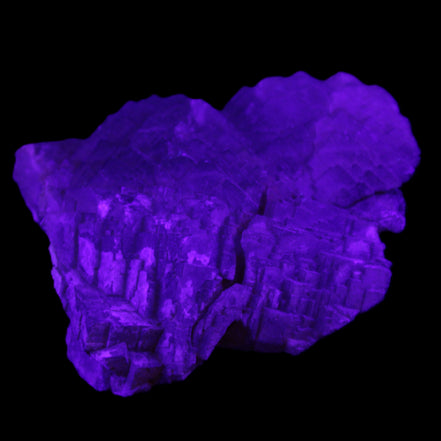 Clear Fluorite stepped cluster 87*80*28mm 238g in UV light - Rocks and Things Store