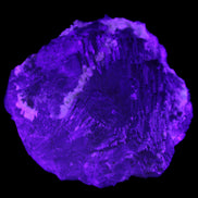 Clear and Coloured Fluorite cluster 110*100*58mm 1056g in UV light - Rocks and Things Store