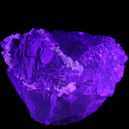 Clear and Coloured Fluorite cluster 110*100*58mm 1056g in UV light - Rocks and Things Store