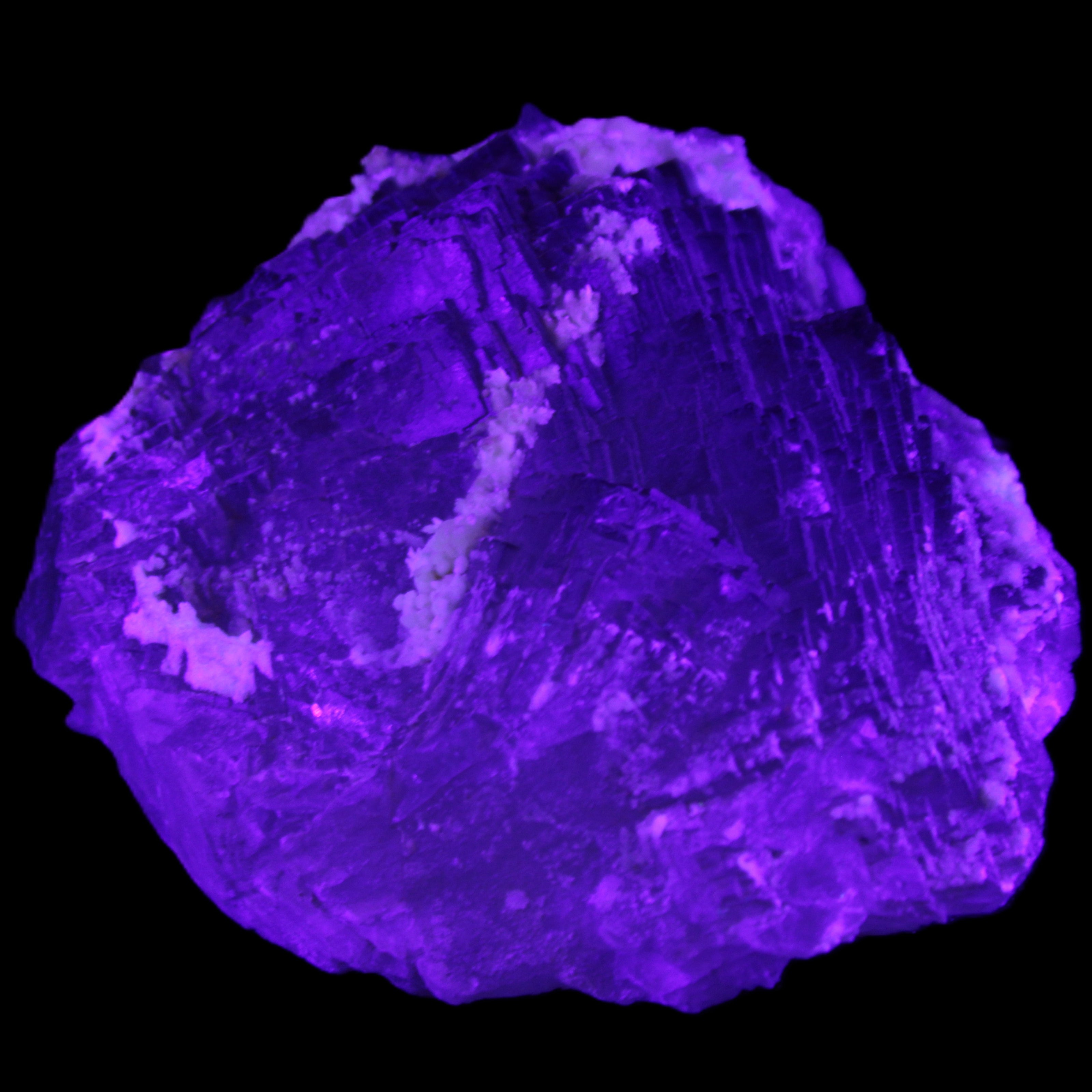 Clear and Coloured Fluorite cluster 110*100*58mm 1056g in UV light - Rocks and Things Store