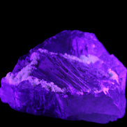 Clear and Coloured Fluorite cluster 110*100*58mm 1056g in UV light - Rocks and Things Store