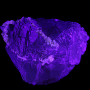 Clear and Coloured Fluorite cluster 110*100*58mm 1056g in UV light - Rocks and Things Store