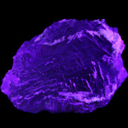 Clear and Coloured Fluorite cluster 110*100*58mm 1056g in UV light - Rocks and Things Store