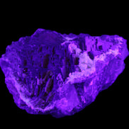 Clear and Coloured Fluorite cluster 110*100*58mm 1056g in UV light - Rocks and Things Store