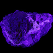 Clear and Coloured Fluorite cluster 110*100*58mm 1056g in UV light - Rocks and Things Store
