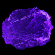 Clear and Coloured Fluorite cluster 110*100*58mm 1056g in UV light - Rocks and Things Store