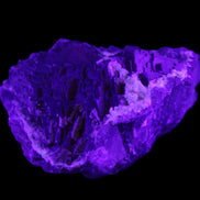Clear and Coloured Fluorite cluster 110*100*58mm 1056g in UV light - Rocks and Things Store