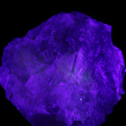 Clear and Coloured Fluorite cluster 110*100*58mm 1056g in UV light - Rocks and Things Store