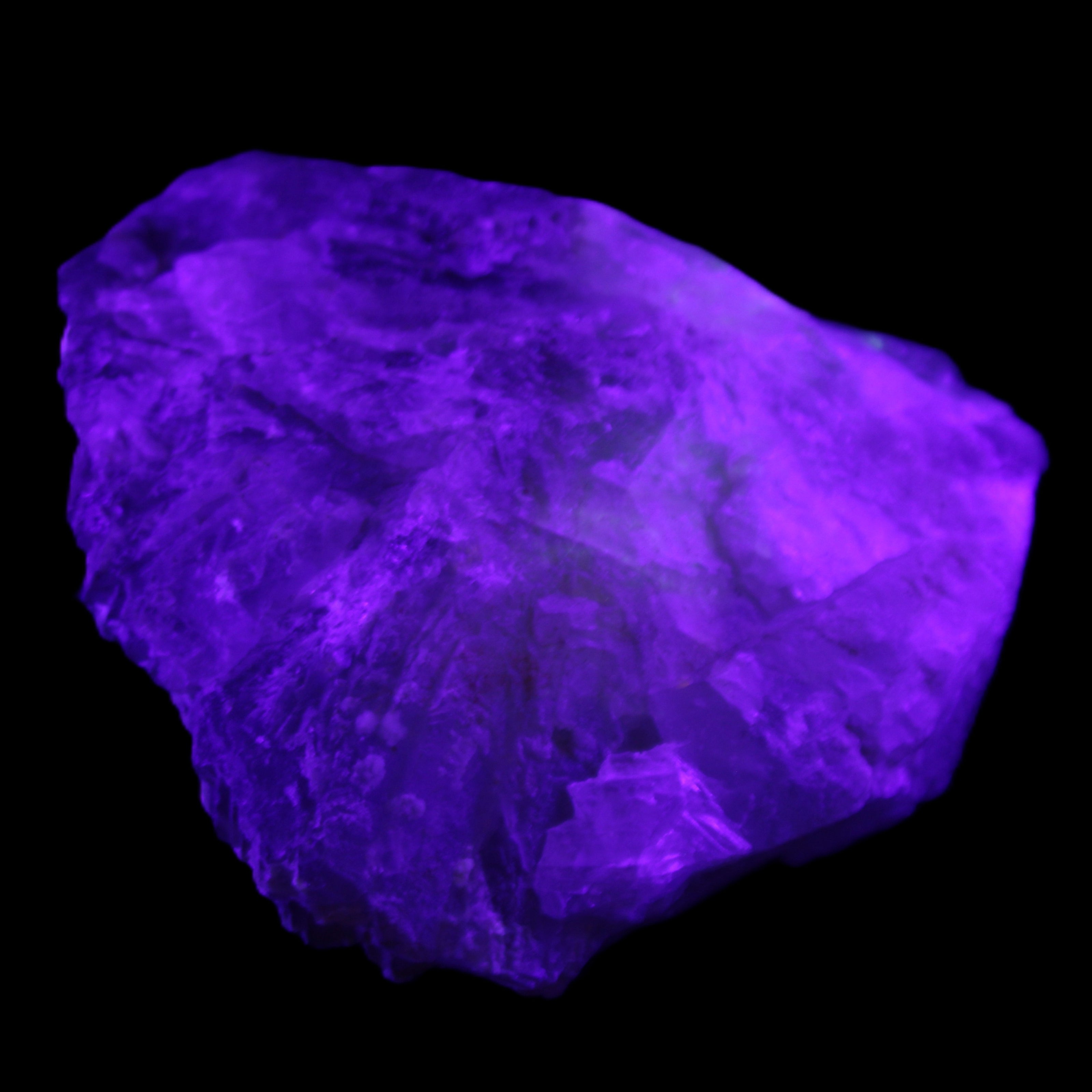 Clear and Coloured Fluorite cluster 110*100*58mm 1056g in UV light - Rocks and Things Store