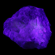 Clear and Coloured Fluorite cluster 110*100*58mm 1056g in UV light - Rocks and Things Store