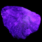 Clear and Coloured Fluorite cluster 110*100*58mm 1056g in UV light - Rocks and Things Store
