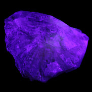 Clear and Coloured Fluorite cluster 110*100*58mm 1056g in UV light - Rocks and Things Store