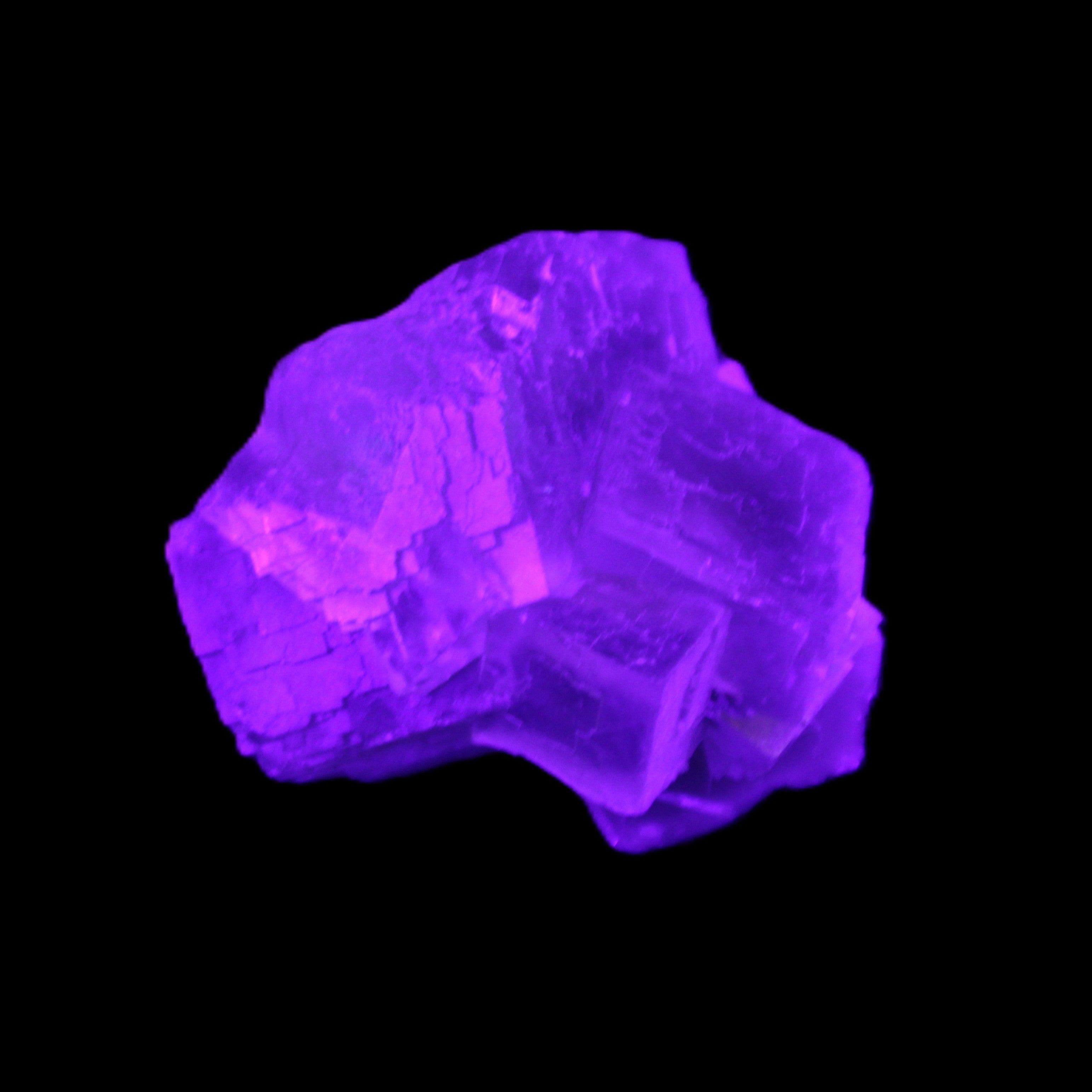 Clear Fluorite cubic cluster 45*40*40mm 102g in UV light - Rocks and Things Store