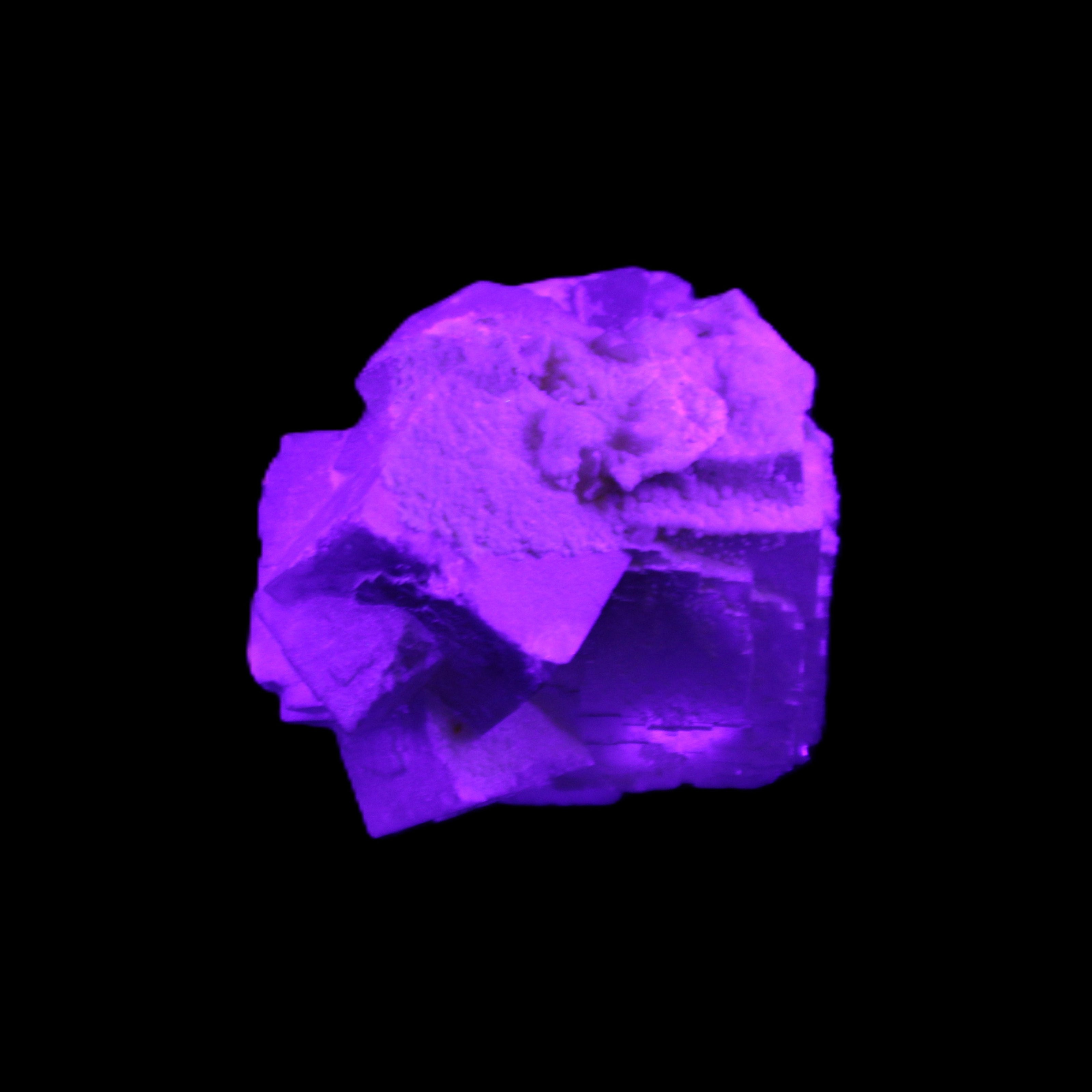 Clear Fluorite cubic cluster 45*40*40mm 102g in UV light - Rocks and Things Store