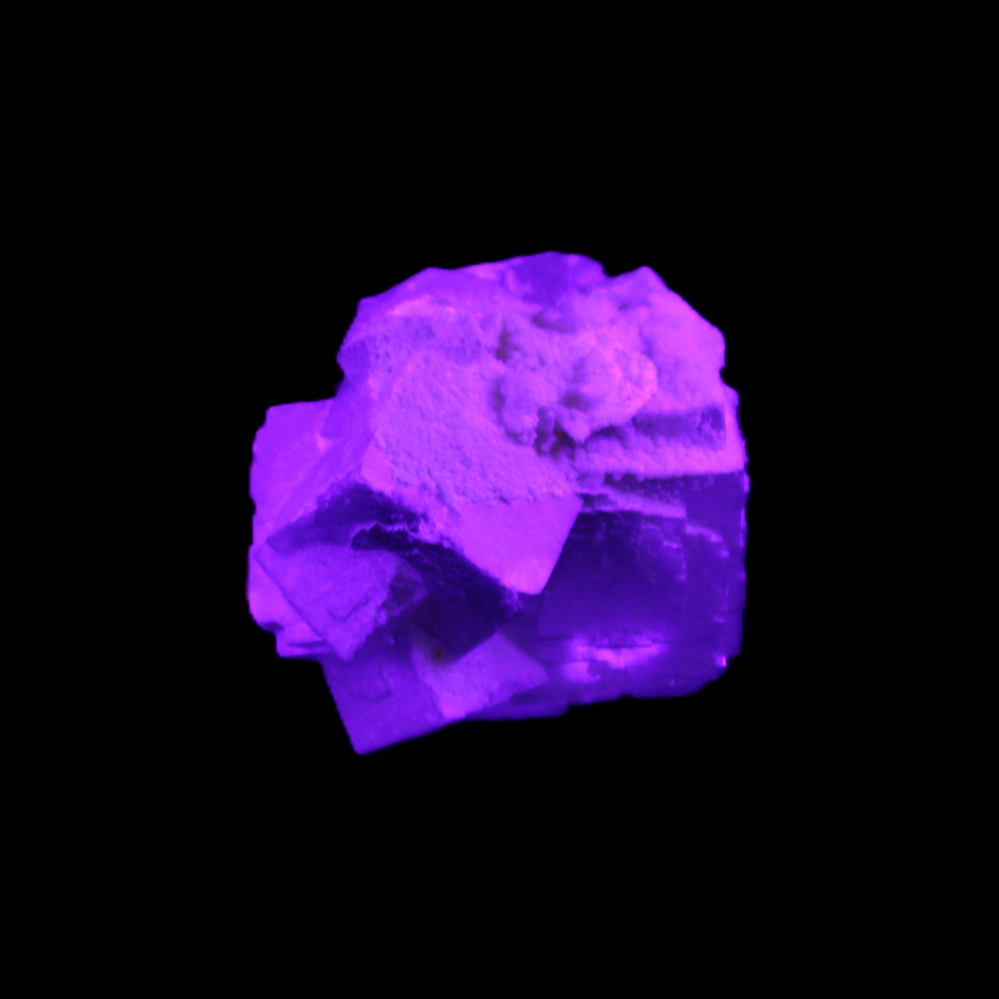 Clear Fluorite cubic cluster 45*40*40mm 102g in UV light - Rocks and Things Store