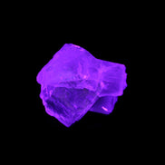 Clear Fluorite cubic cluster 45*40*40mm 102g in UV light - Rocks and Things Store