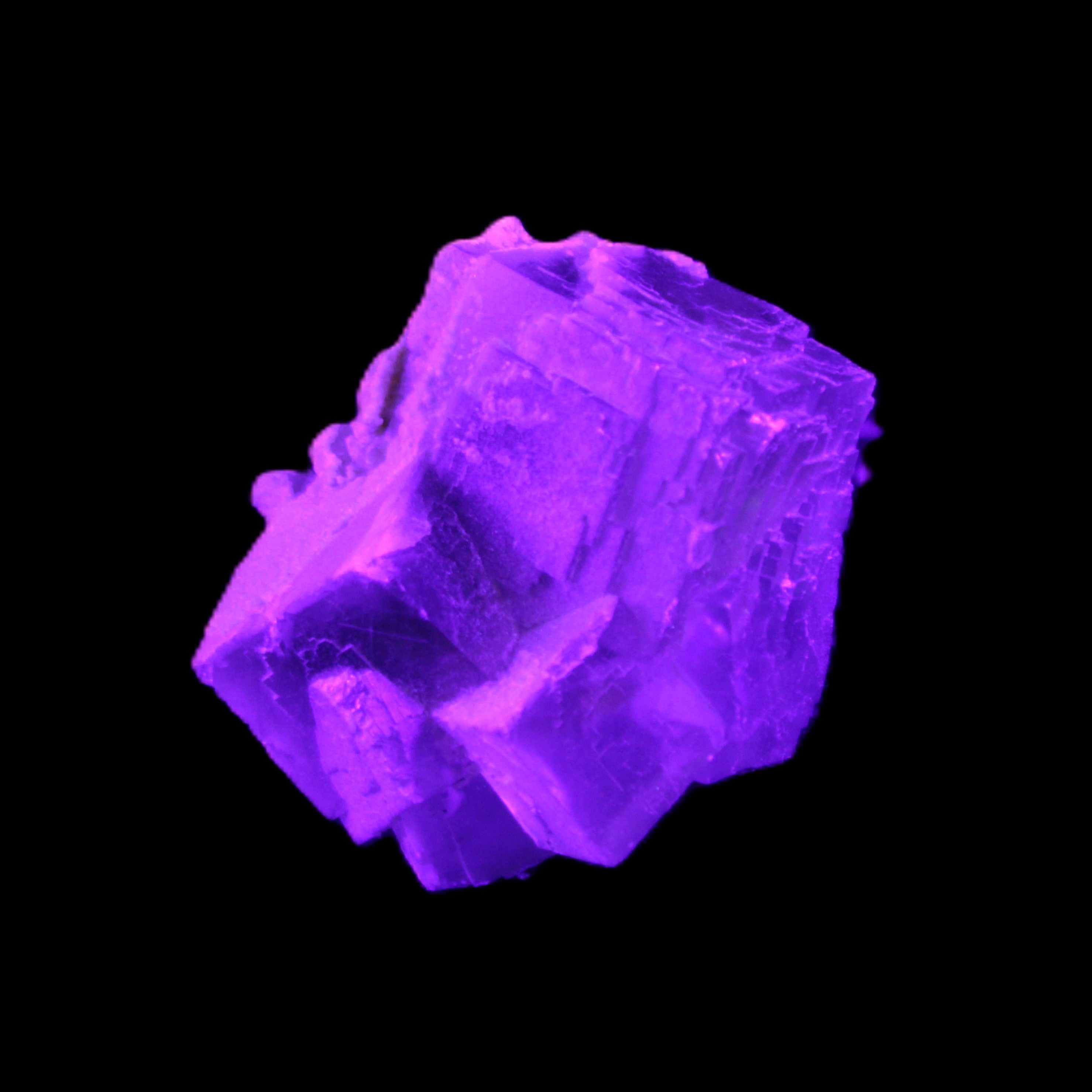 Clear Fluorite cubic cluster 45*40*40mm 102g in UV light - Rocks and Things Store