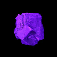 Clear Fluorite cubic cluster 45*40*40mm 102g in UV light - Rocks and Things Store